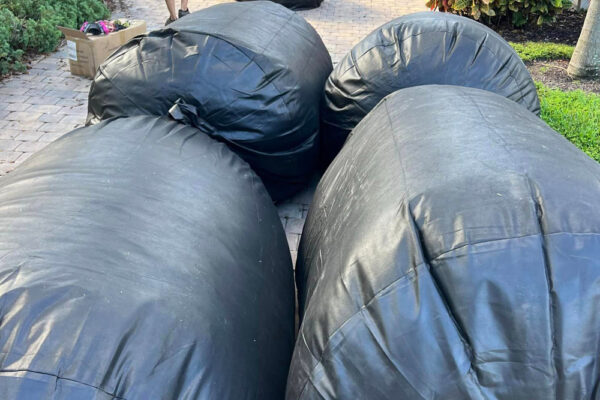 Old insulation removed from attic in bags